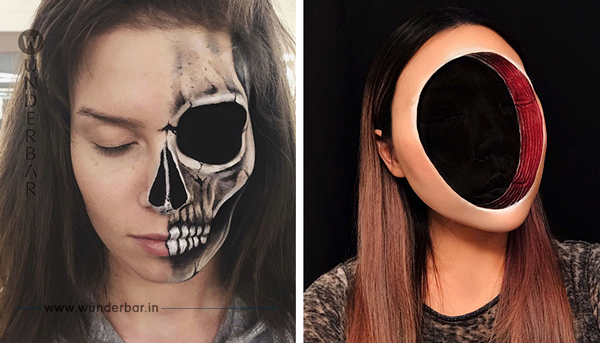Das Mädchen schafft mit Make-up auf ihrem Gesicht eigenartige Tatoos, die so aussehen, als ob sie in der Wirklichkeit wären