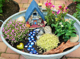 Für DIY Gartengestaltung aus Zinkwanne Blumenkasten, Kerzenständer oder Gartenteich machen