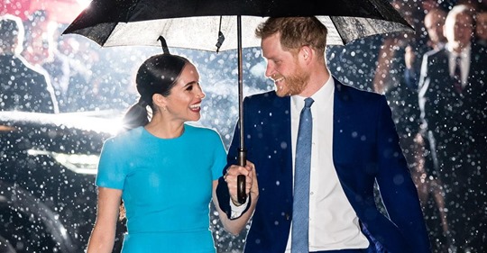 Meghan Markle und Prinz Harry funkeln unter dem Regenschirm, während das Londoner Foto für sich selbst spricht