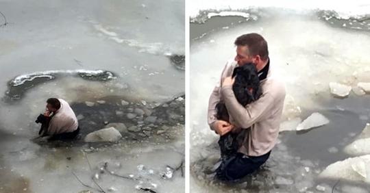 Ein Mann springt in das eisige Wasser eines Flusses, um einen kleinen Hund zu retten, der sich verfangen hat